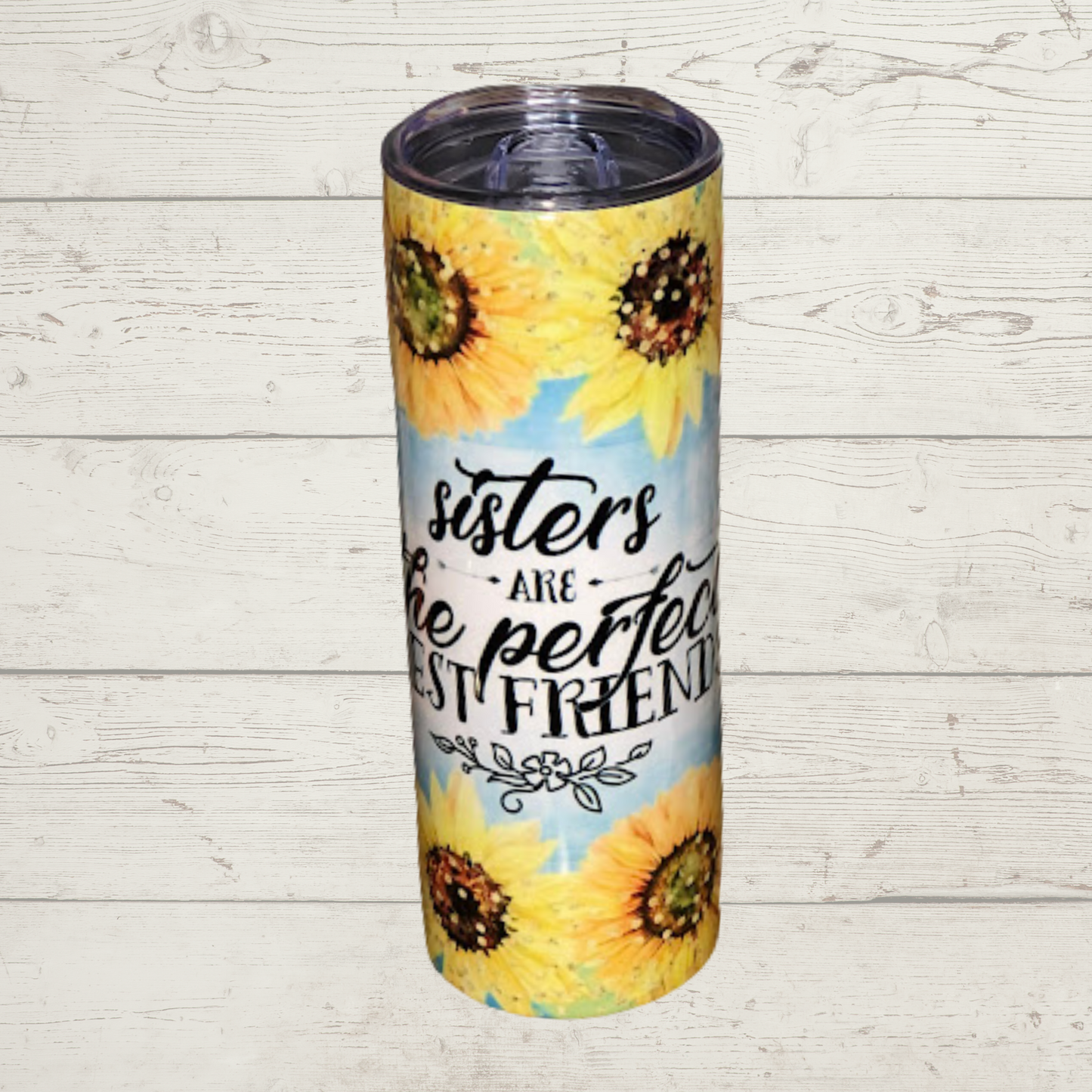 Yellow Flowers with Blue Background and Text Sisters are the perfect best friends on a Quality 20 oz Tumbler/Mug/Cup with Lid and Stainless Reusale Straw Farm-Lite Candles Custom Gifts and More