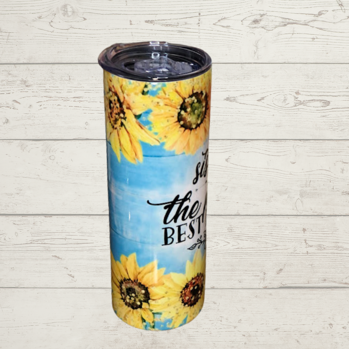 Yellow Flowers with Blue Background and Text Sisters are the perfect best friends on a Quality 20 oz Tumbler/Mug/Cup with Lid and Stainless Reusale Straw Farm-Lite Candles Custom Gifts and More