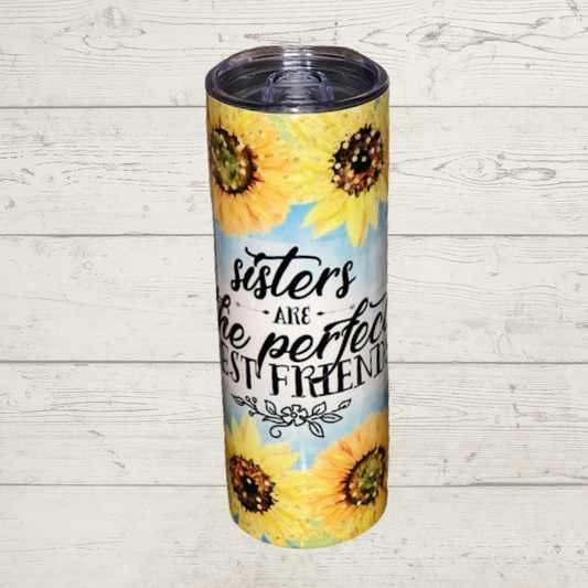 Yellow  Flowers with Blue Background and Text Sisters are the perfect best friends on a Quality 20 oz Tumbler/Mug/Cup with Lid and Stainless Reusale Straw Farm-Lite Candles Custom Gifts and More